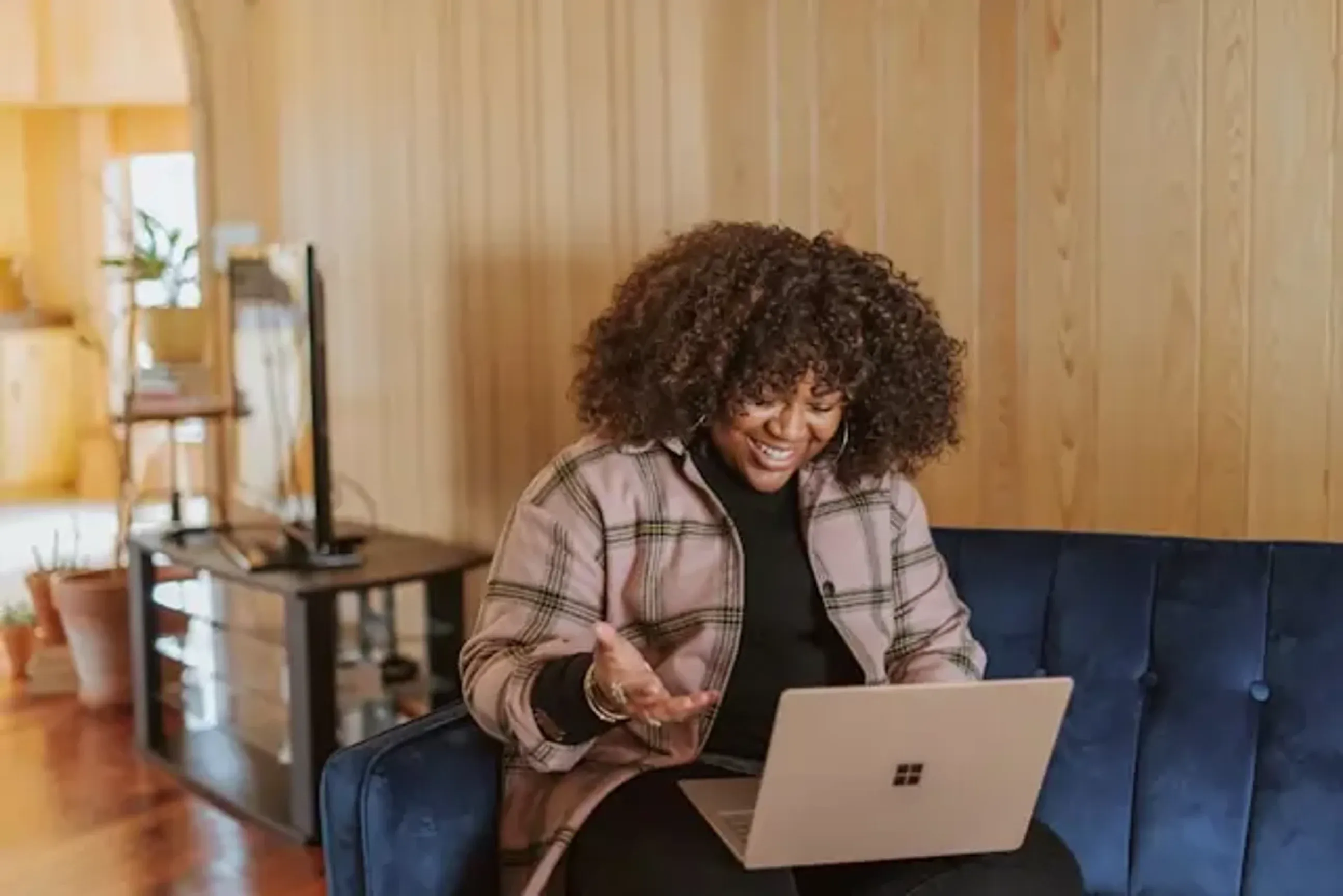 Woman debunking AI myth on her laptop.